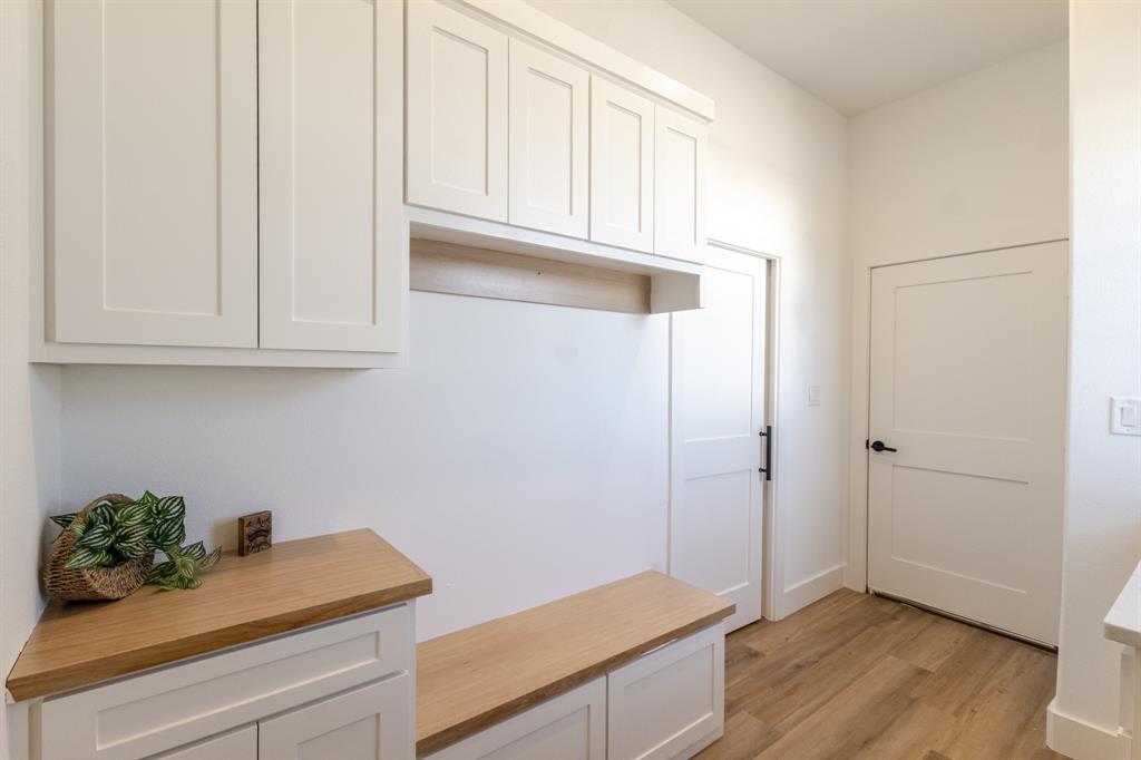 2900 8th Avenue Fort Worth, TX 76110 - Photo 26 of 32 a kitchen with appliances and cabinets