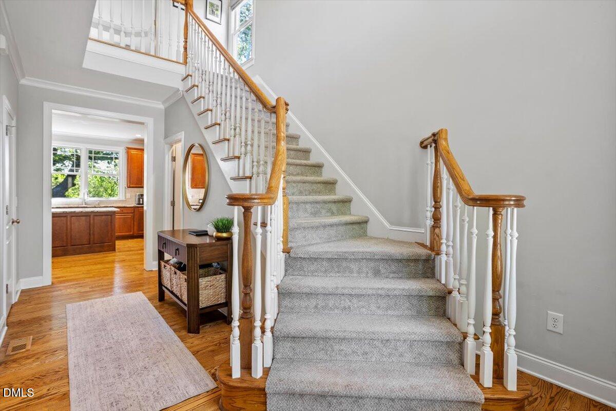 809 Gannett Street Raleigh, NC 27606 - Photo 4 of 41 a view of entryway and hall with wooden floor
