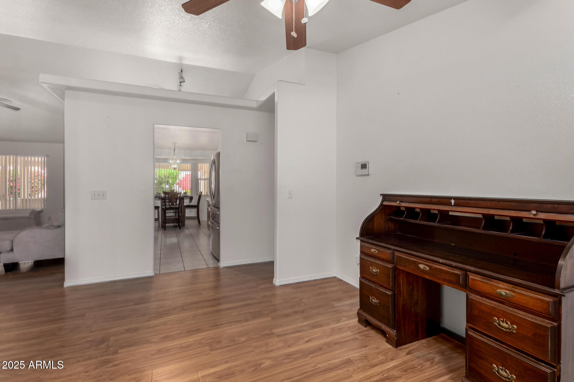 1794 West 11th Avenue Apache Junction, AZ 85120 - Photo 13 of 33 a view of an empty room and wooden floor