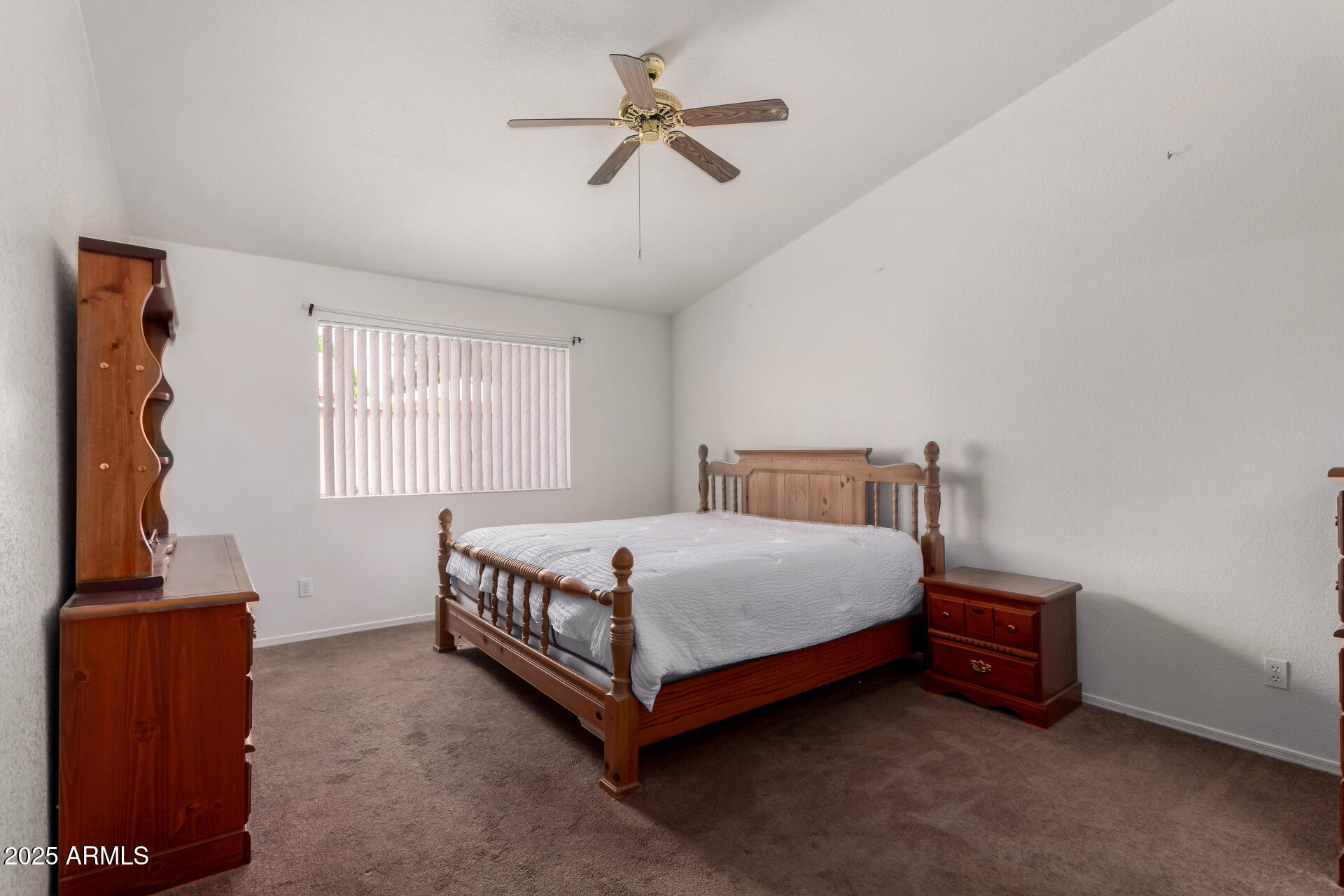 1794 West 11th Avenue Apache Junction, AZ 85120 - Photo 16 of 33 a bedroom with a bed and a window