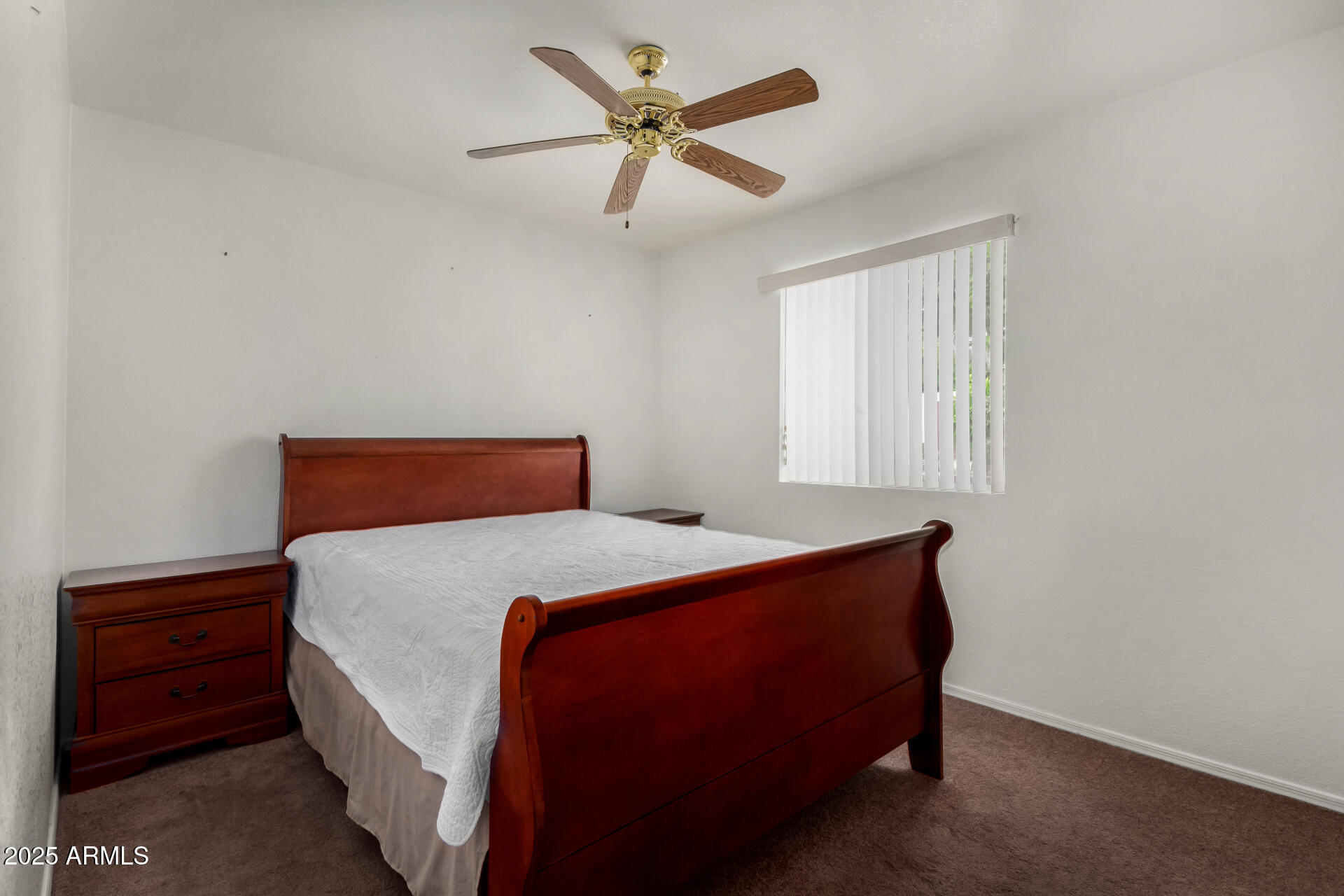 1794 West 11th Avenue Apache Junction, AZ 85120 - Photo 21 of 33 a bedroom with a bed and a closet