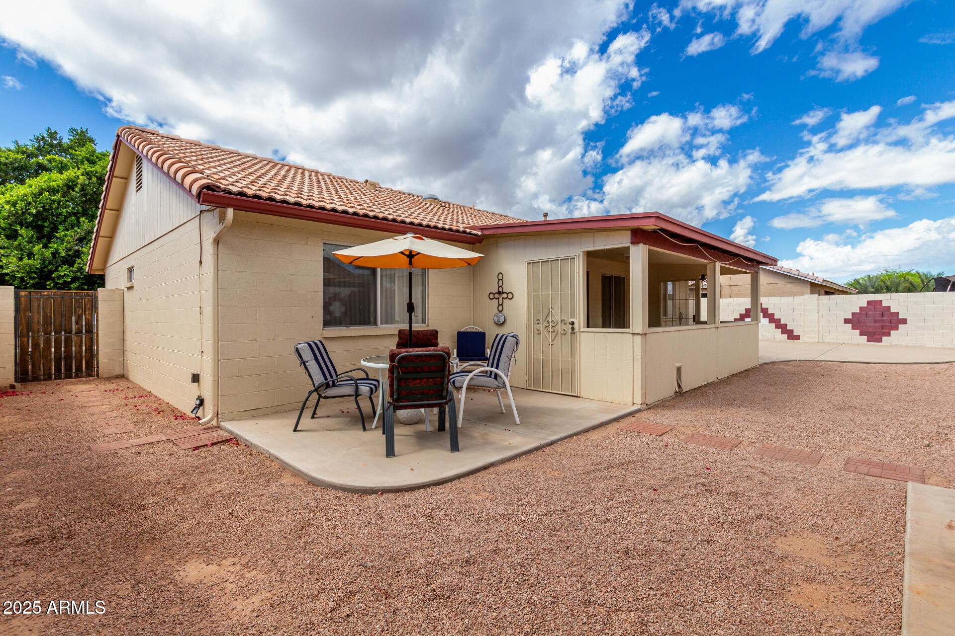1794 West 11th Avenue Apache Junction, AZ 85120 - Photo 29 of 33 a view of a house with patio
