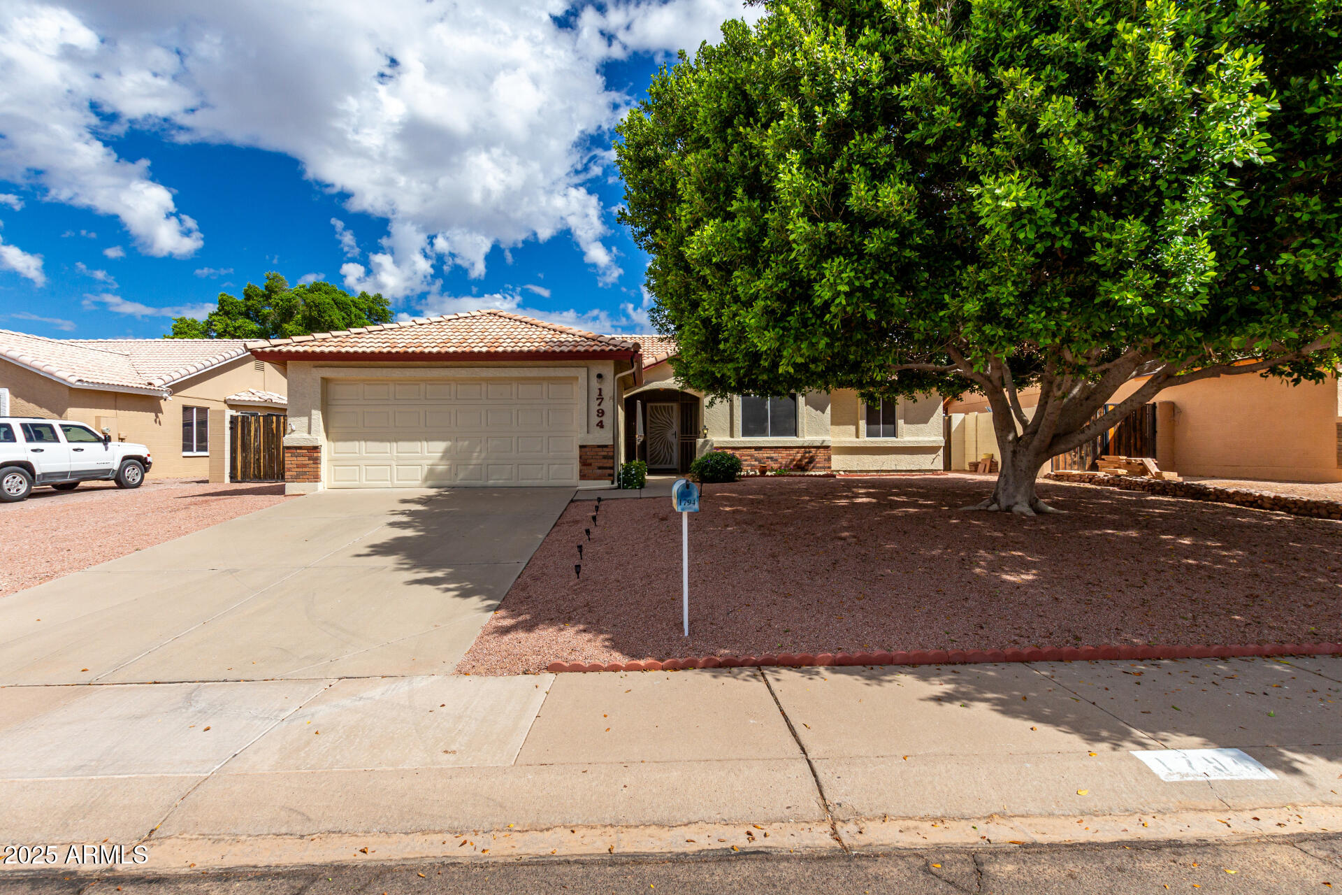 1794 West 11th Avenue Apache Junction, AZ 85120 - Photo 33 of 33 a view of a house with a street