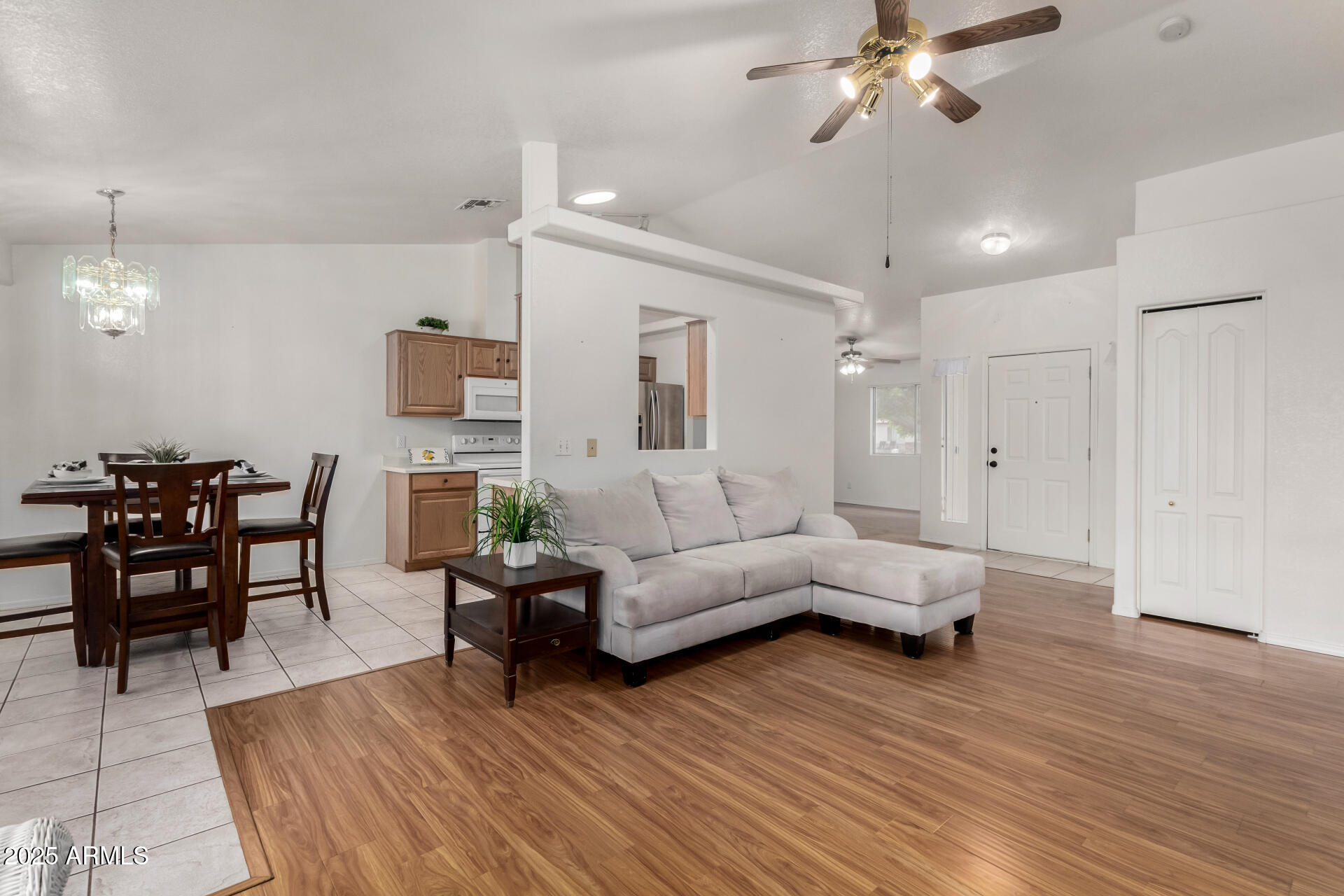 1794 West 11th Avenue Apache Junction, AZ 85120 - Photo 6 of 33 a living room with furniture and a wooden floor