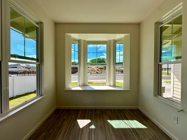 a kitchen with stainless steel appliances a refrigerator and wooden cabinets