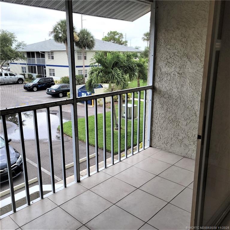 1526 Southeast Royal Green Circle, Unit 205 Port St. Lucie, FL 34952 - Photo 16 of 34 a view of a balcony
