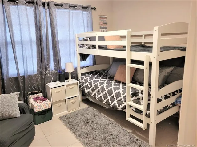 a bathroom with a sink toilet and mirror