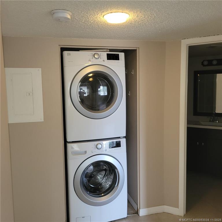 1526 Southeast Royal Green Circle, Unit 205 Port St. Lucie, FL 34952 - Photo 23 of 34 a utility room with dryer and washer