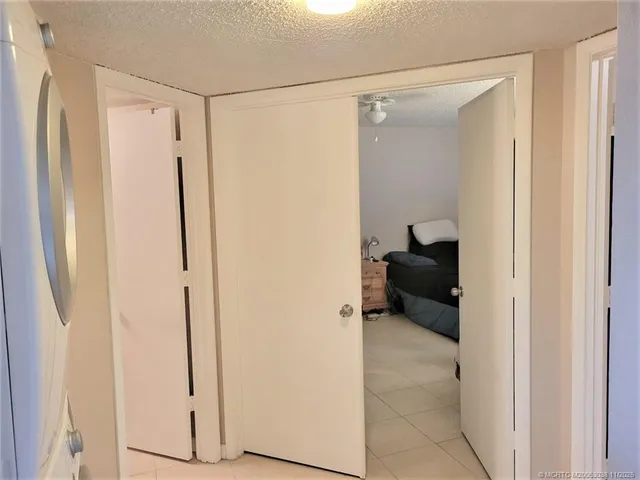 a bathroom with a sink vanity and a mirror