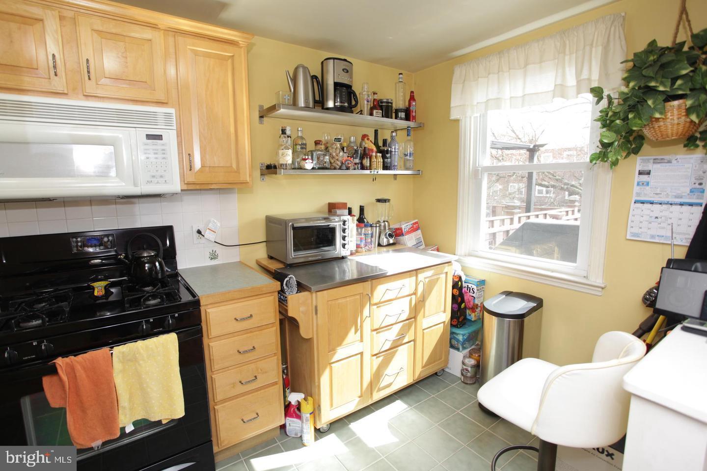 414 Rively Avenue Collingdale, PA 19023 - Photo 12 of 27 a kitchen with stainless steel appliances a stove a sink and a cabinets
