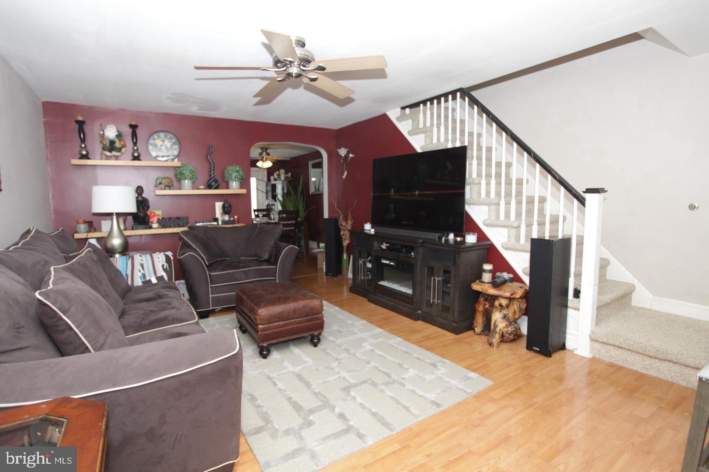 414 Rively Avenue Collingdale, PA 19023 - Photo 5 of 27 a living room with furniture and wooden floor