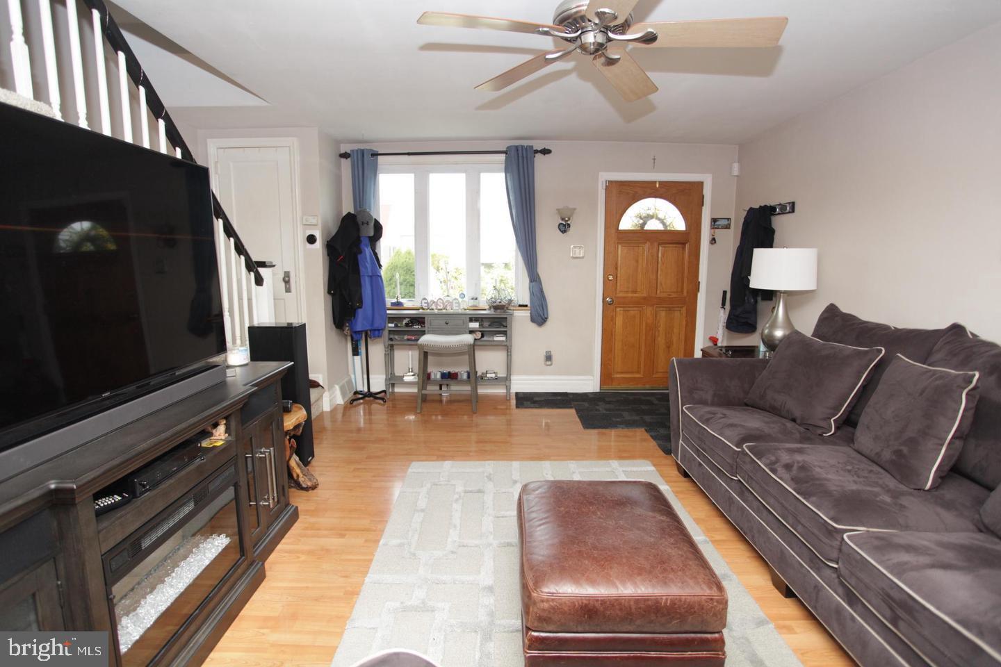 414 Rively Avenue Collingdale, PA 19023 - Photo 7 of 27 a living room with furniture and wooden floor