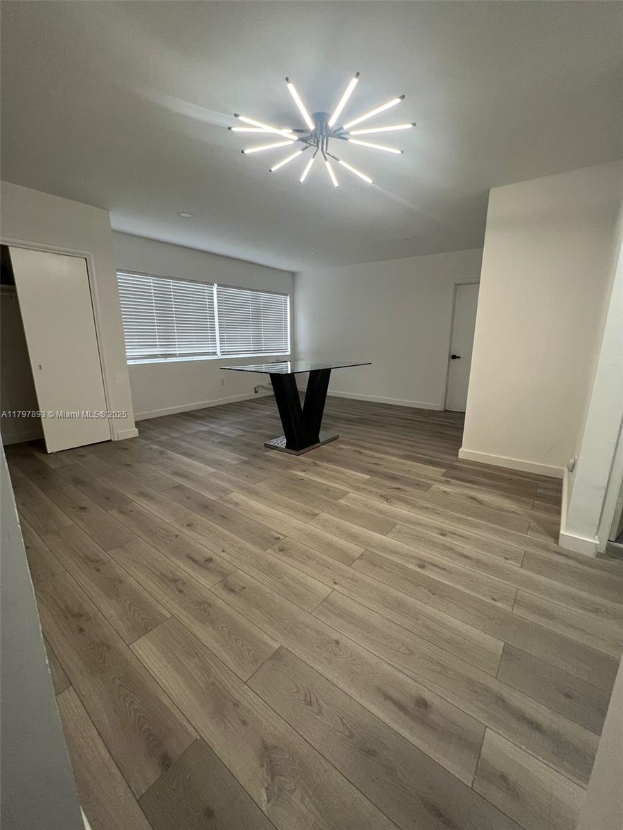 Surfside Surfside, FL 33154 - Photo 3 of 10 an empty room with closet and windows