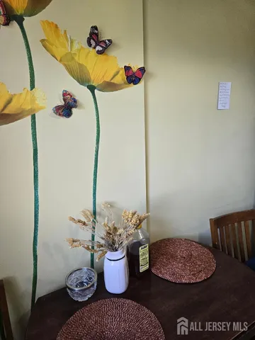 a kitchen with stainless steel appliances a stove and cabinets