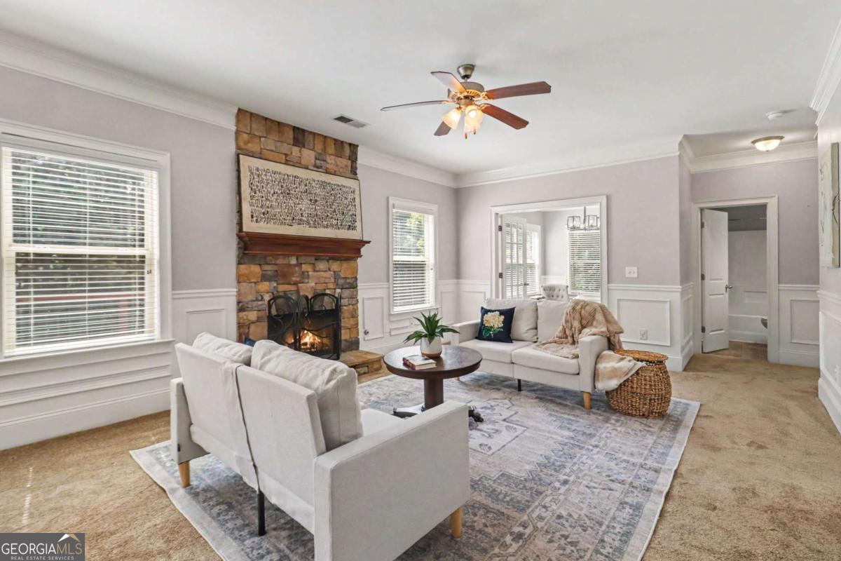 207 George Wynn Road Palmetto, GA 30268 - Photo 6 of 32 a living room with furniture and a large window
