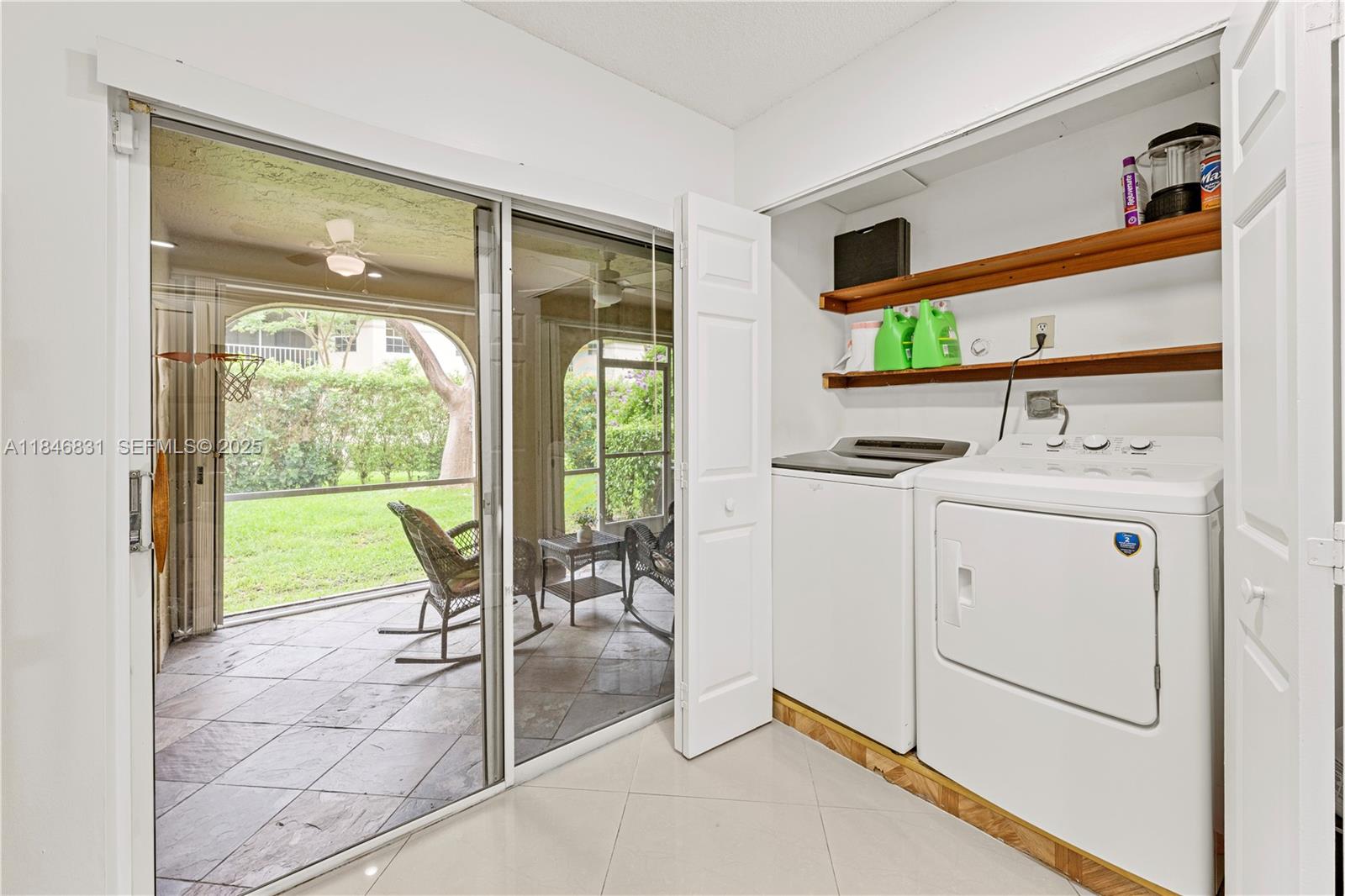 6603 Via Regina, Unit 50 Boca Raton, FL 33433 - Photo 18 of 48 a room with storage and utility