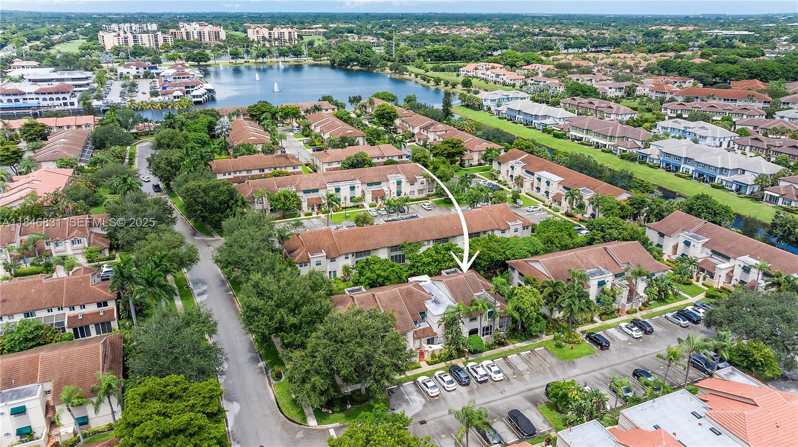 6603 Via Regina, Unit 50 Boca Raton, FL 33433 - Photo 36 of 48 an aerial view of lake and residential houses with outdoor space