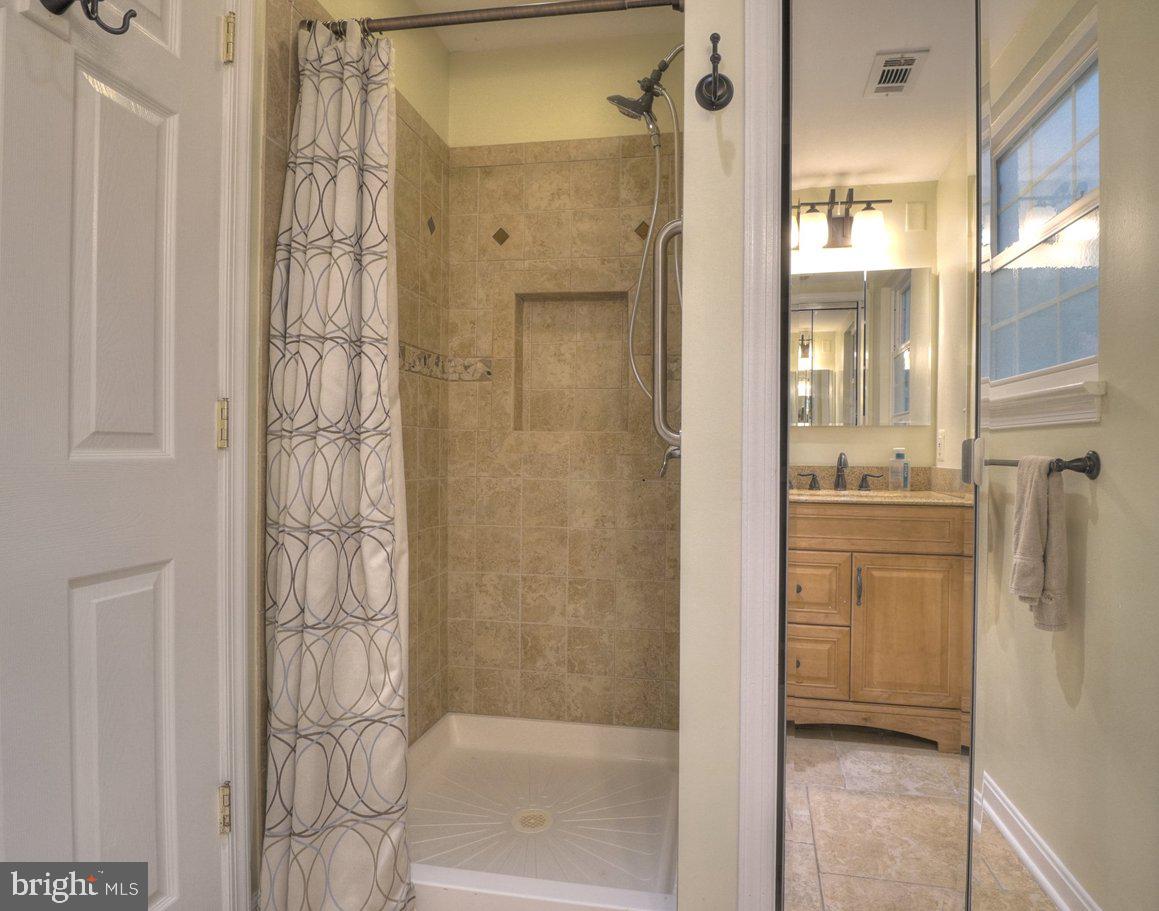 2405 Earlsgate Court Reston, VA 20191 - Photo 35 of 56 Modern bathroom with elegant finishes.
