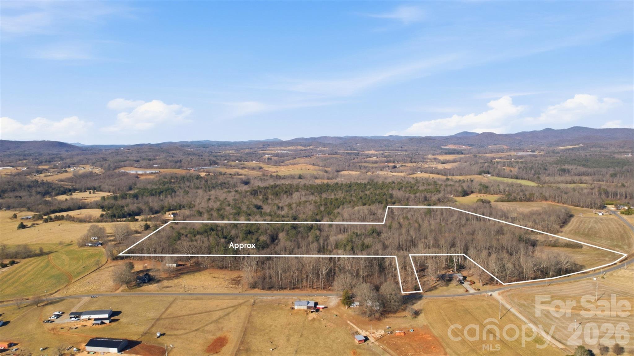 0 3 Forks Church Road Taylorsville, NC 28681 - Photo 2 of 23 a view of a swimming pool with mountains in the background