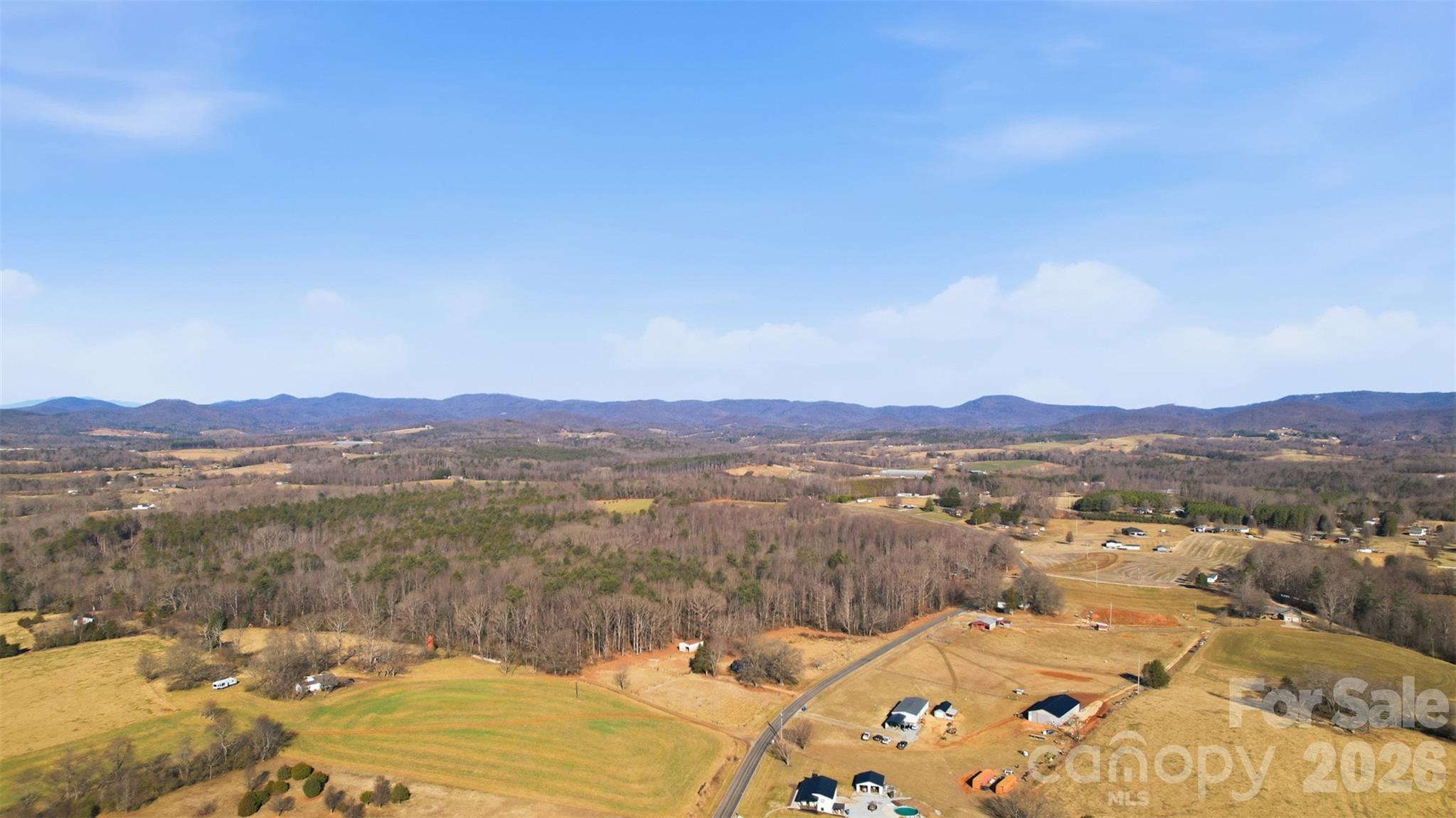 0 3 Forks Church Road Taylorsville, NC 28681 - Photo 6 of 23 a view of a lake with a mountain