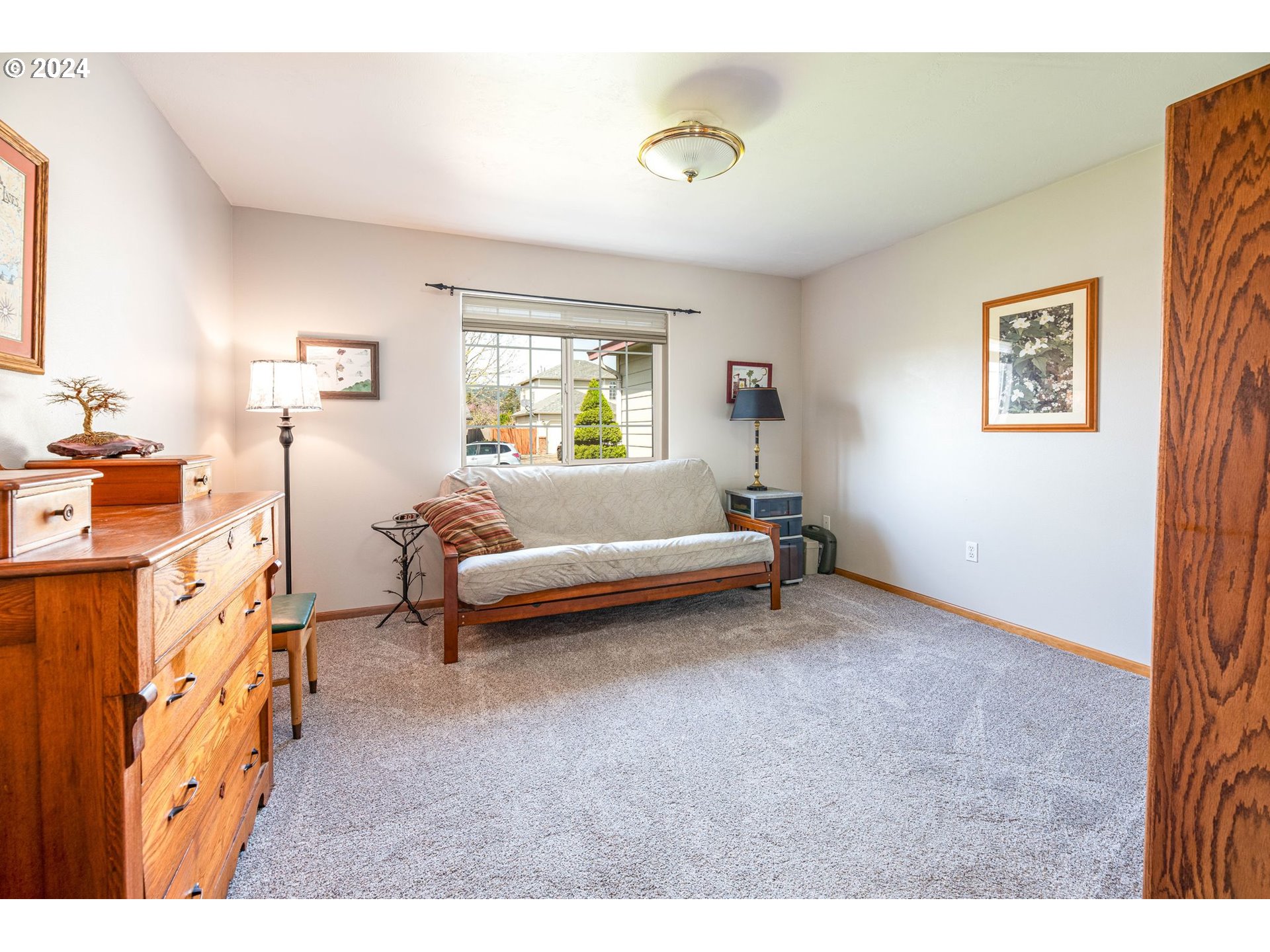 1769 Carriage Place Springfield, OR 97477 - Photo 19 of 23 a bedroom with furniture and a window