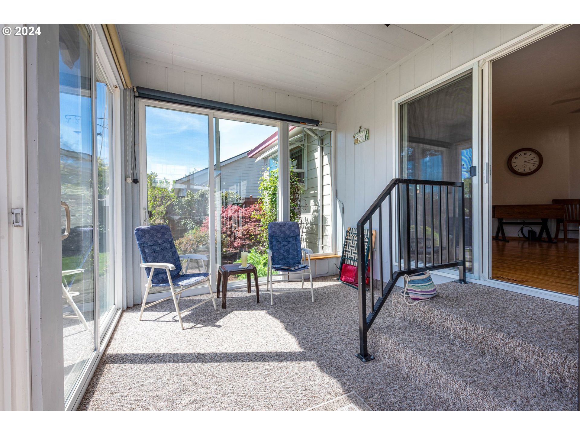 1769 Carriage Place Springfield, OR 97477 - Photo 10 of 23 a living room with furniture and a floor to ceiling window