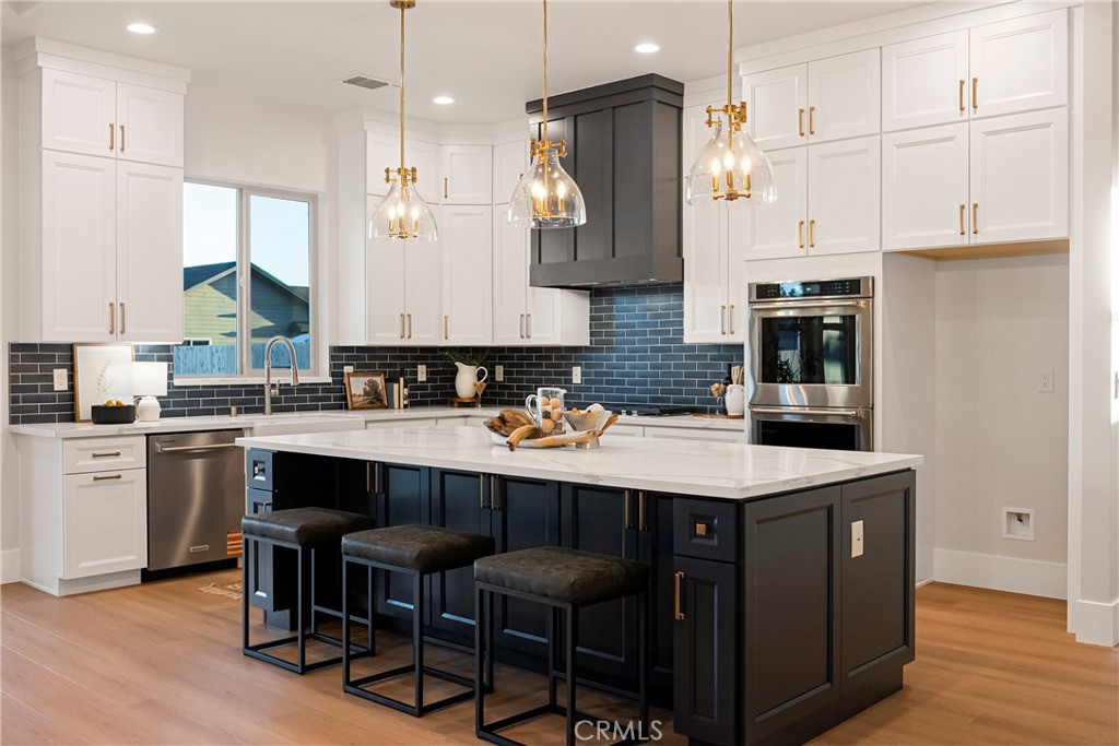 500 Sunset Drive Paradise, CA 95969 - Photo 13 of 43 a kitchen with a sink cabinets and wooden floor