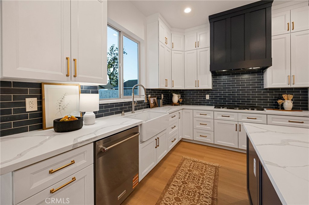500 Sunset Drive Paradise, CA 95969 - Photo 14 of 43 a kitchen with stainless steel appliances white cabinets sink and a dishwasher