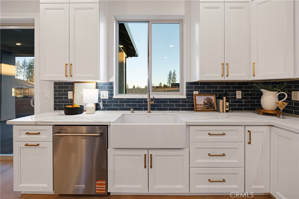 500 Sunset Drive Paradise, CA 95969 - Photo 15 of 43 a kitchen with cabinets appliances a sink and a counter top space