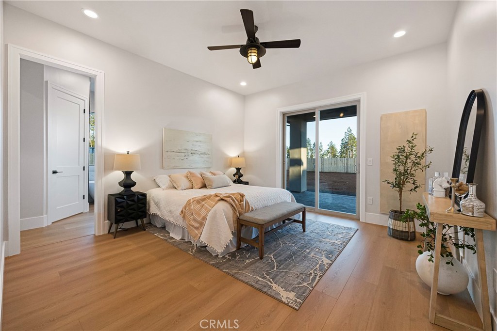 500 Sunset Drive Paradise, CA 95969 - Photo 20 of 43 a bed room with a bed tv and a mirror