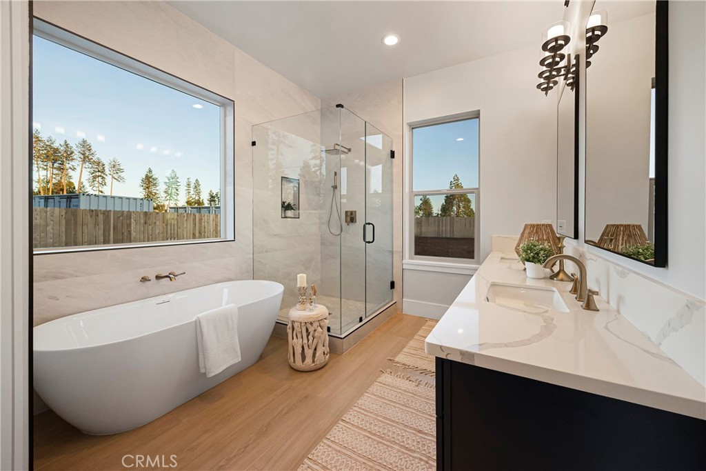 500 Sunset Drive Paradise, CA 95969 - Photo 23 of 43 a spacious bathroom with a tub sink and mirror