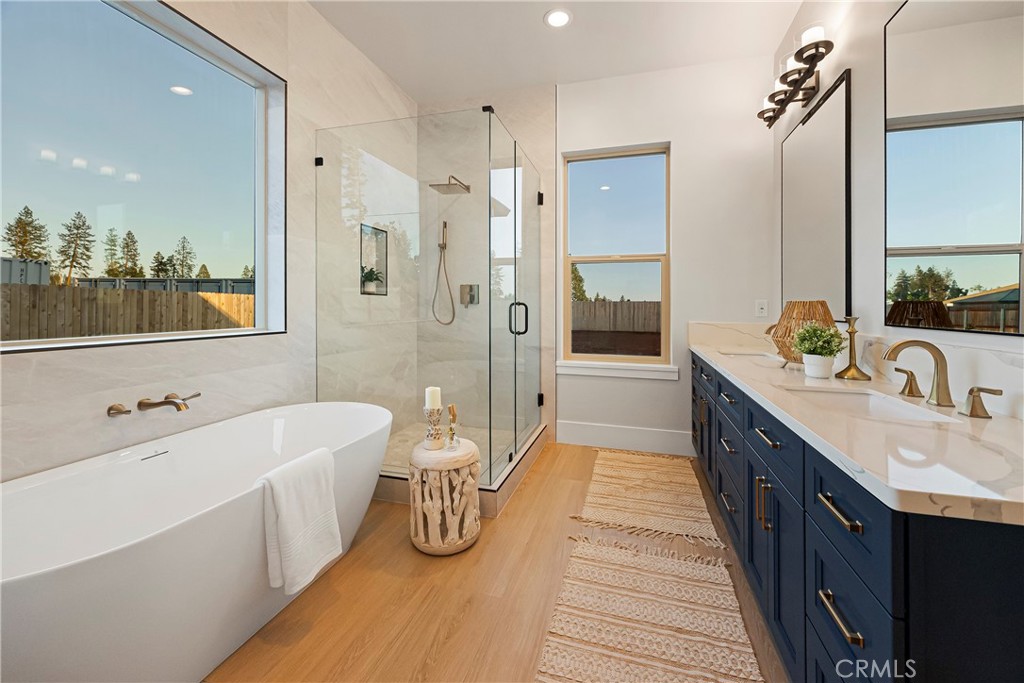 500 Sunset Drive Paradise, CA 95969 - Photo 24 of 43 a spacious bathroom with a tub sink shower and mirror