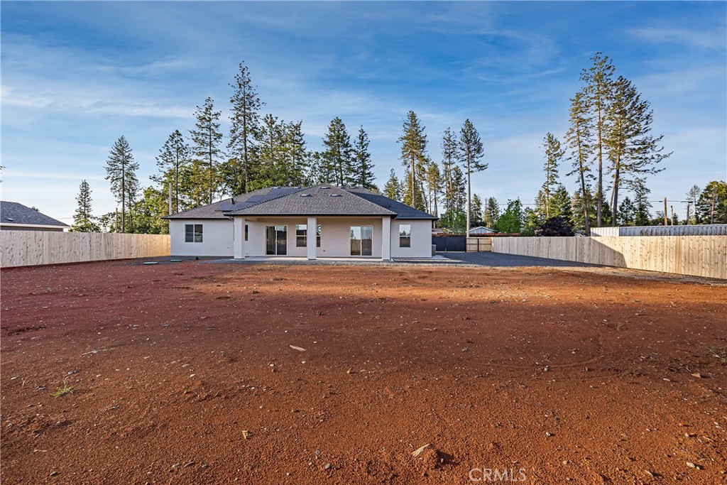 500 Sunset Drive Paradise, CA 95969 - Photo 36 of 43 a front view of a house with a yard and trees