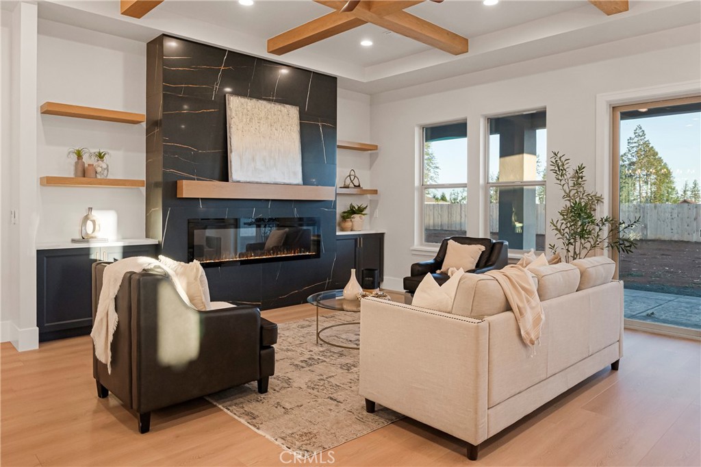 500 Sunset Drive Paradise, CA 95969 - Photo 9 of 43 a living room with furniture and a fireplace