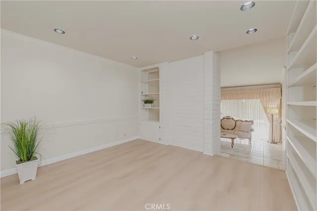 a view of a chairs and table in a room