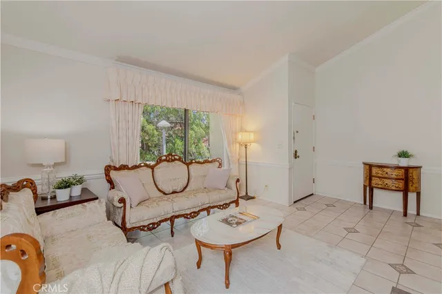 a bedroom with a large bed and a large window