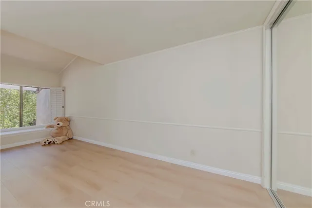 a view of a hallway with staircase
