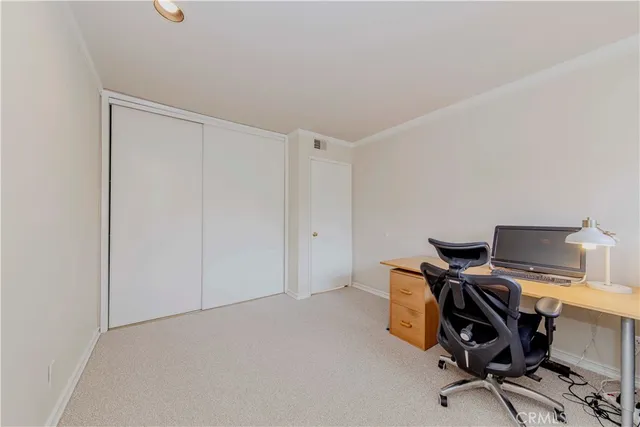 an aerial view of residential houses with outdoor space and street view