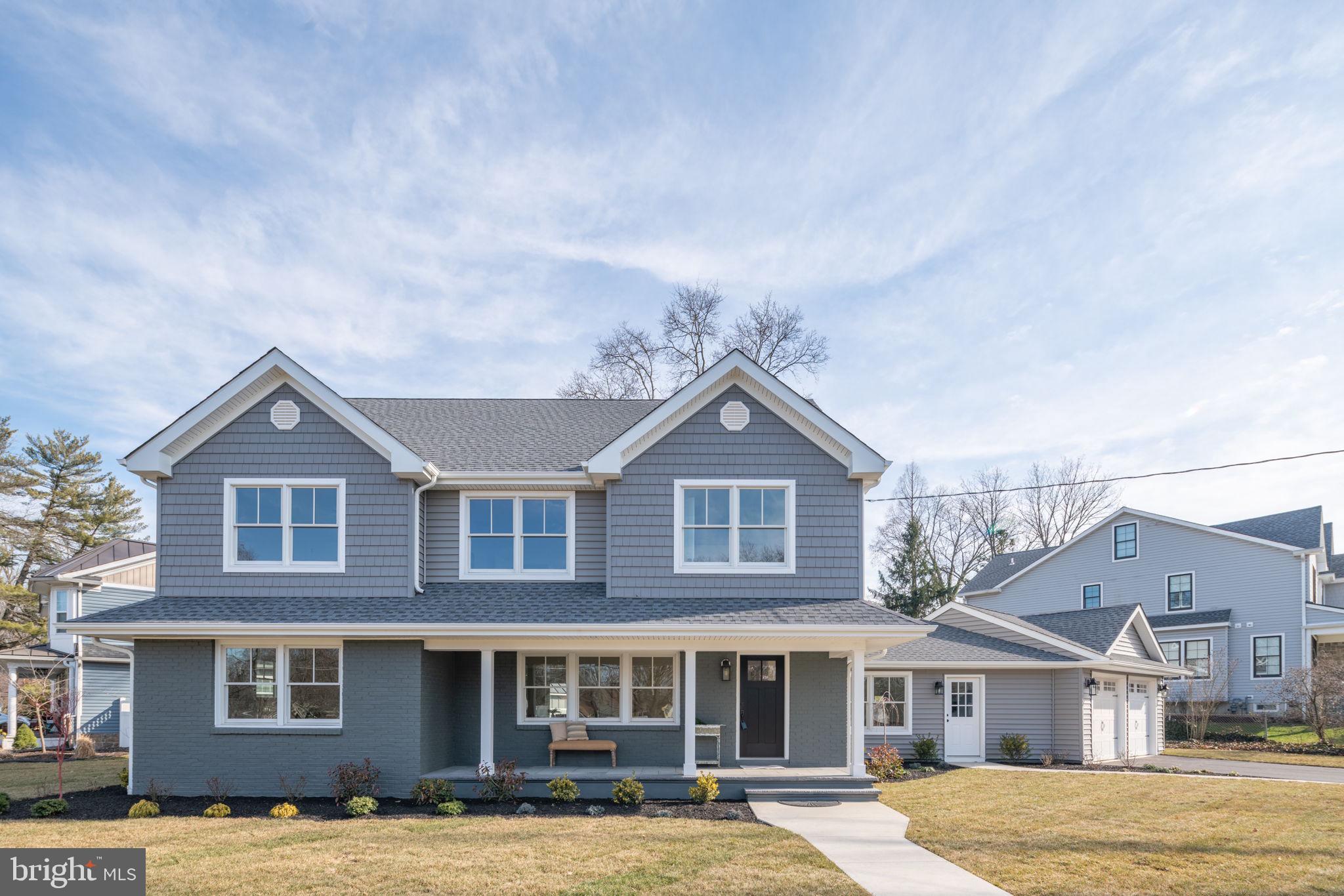 745 Cedar Avenue Haddonfield, NJ 08033 - Photo 1 of 55 a front view of a house with a yard