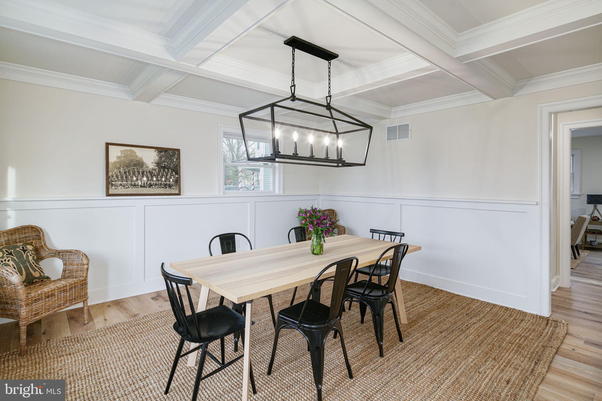 745 Cedar Avenue Haddonfield, NJ 08033 - Photo 14 of 55 a view of a dining room with furniture and wooden floor