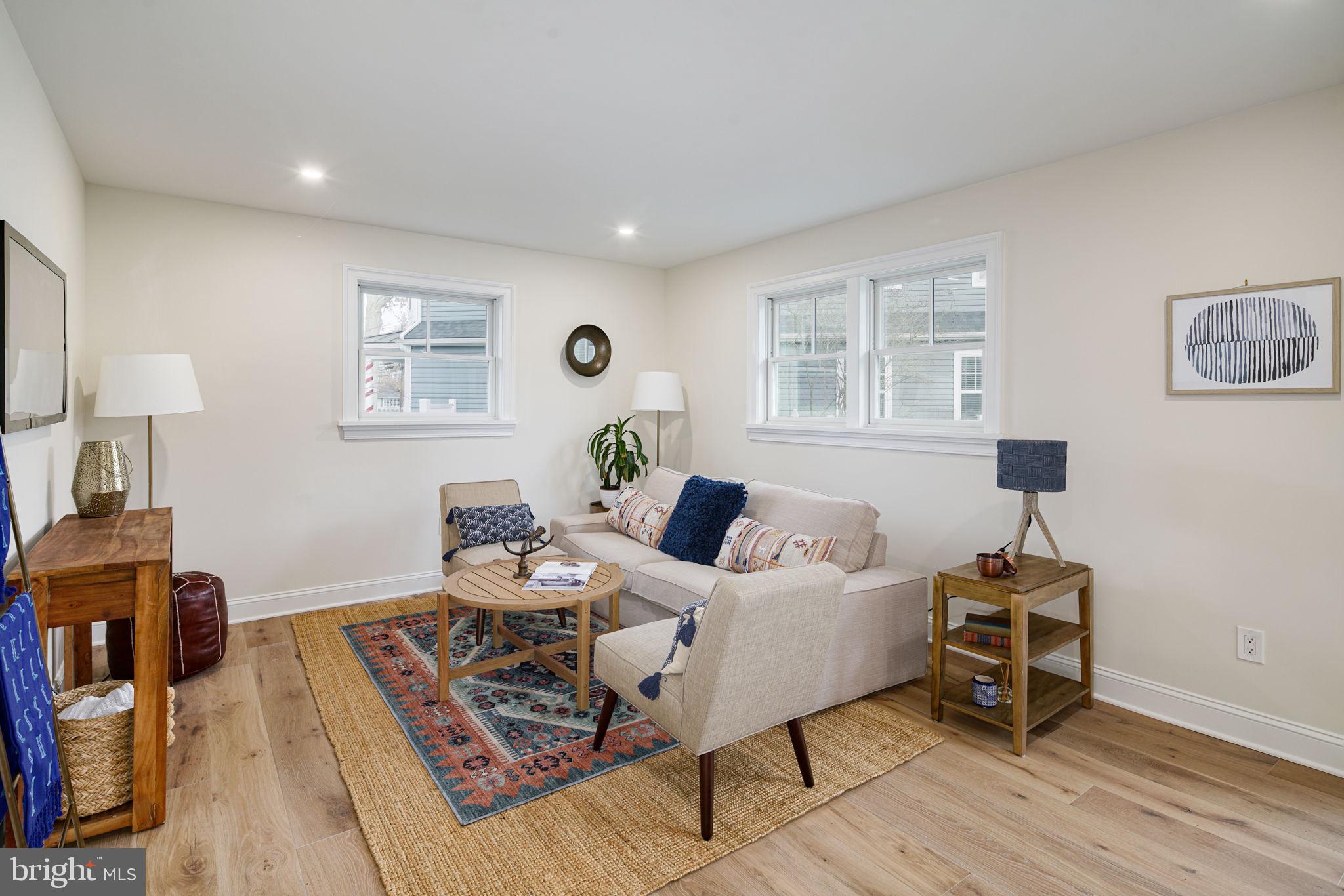 745 Cedar Avenue Haddonfield, NJ 08033 - Photo 15 of 55 a living room with furniture and wooden floor