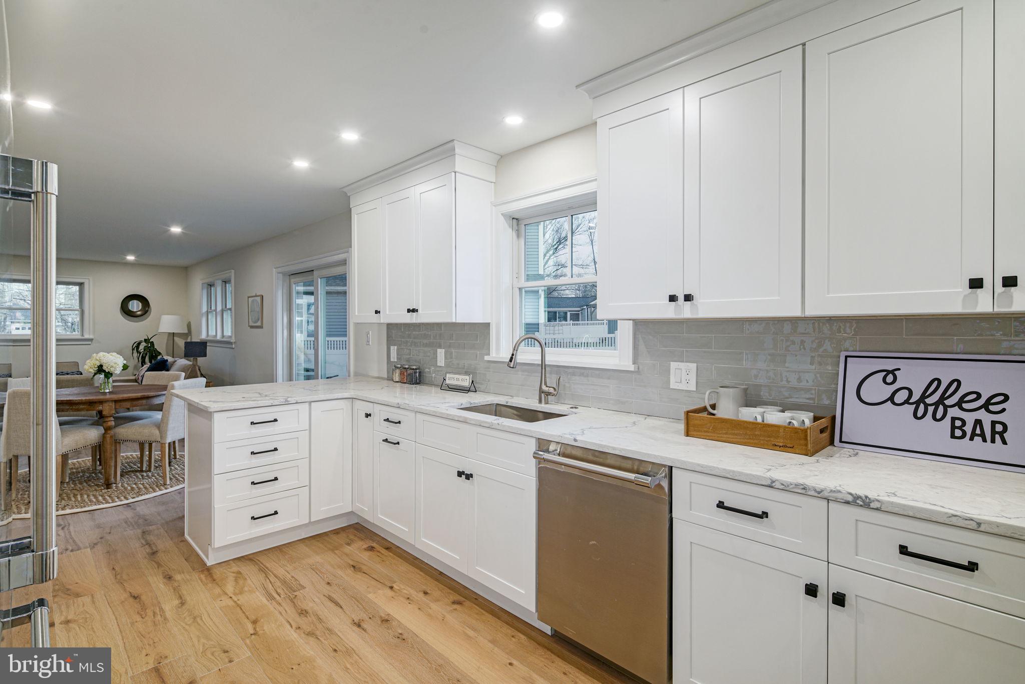 745 Cedar Avenue Haddonfield, NJ 08033 - Photo 19 of 55 a kitchen with white cabinets and sink