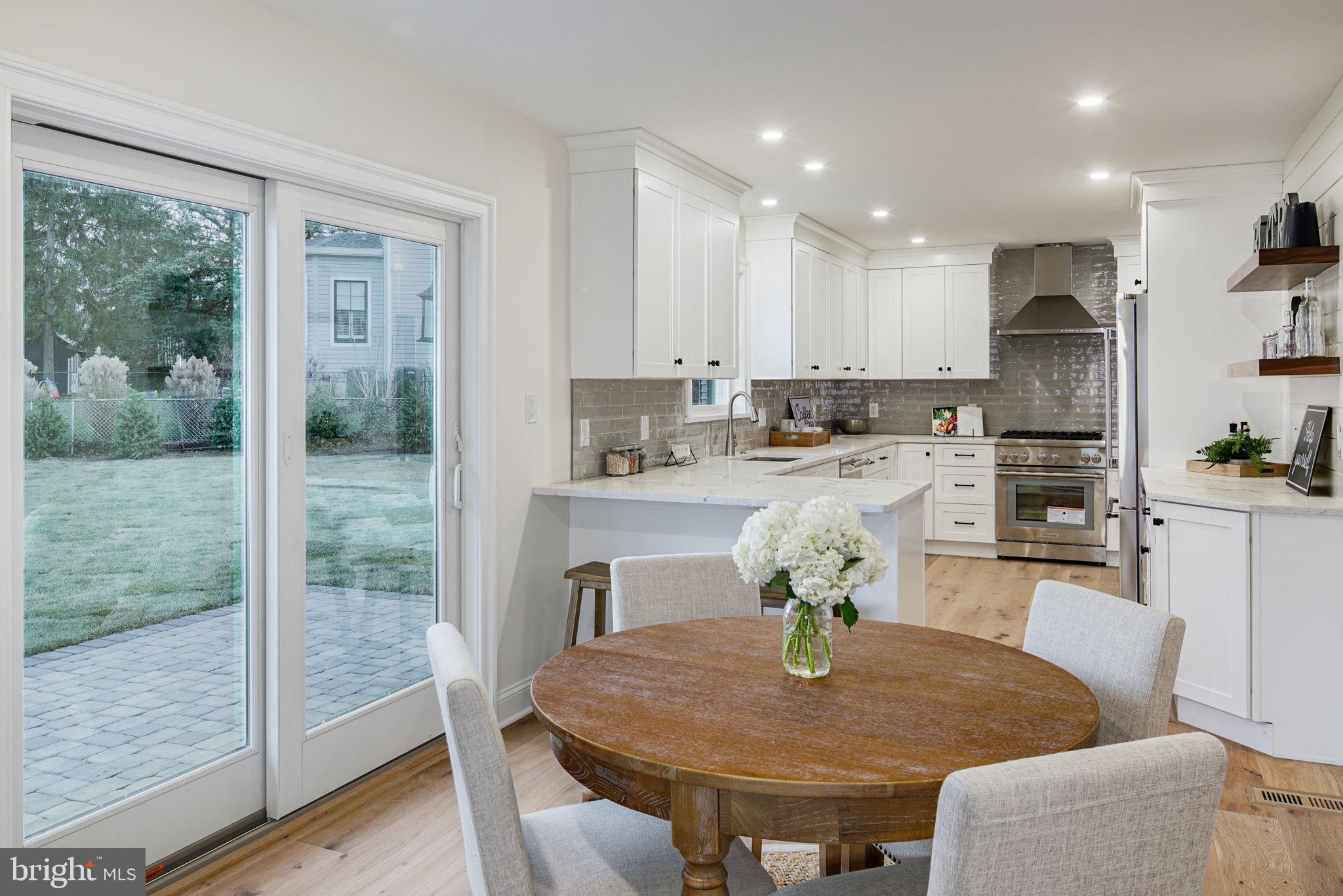 745 Cedar Avenue Haddonfield, NJ 08033 - Photo 24 of 55 a view of a dining room with furniture window and outside view
