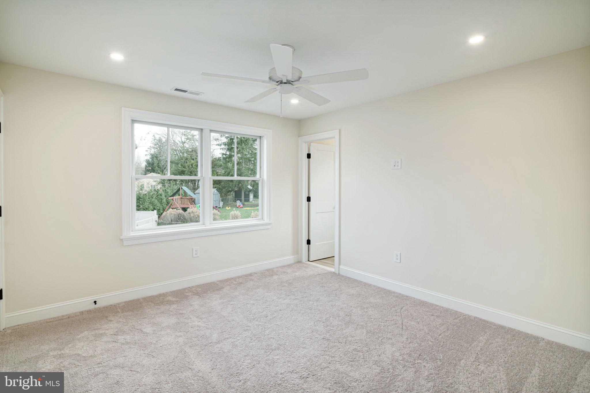 745 Cedar Avenue Haddonfield, NJ 08033 - Photo 37 of 55 an empty room with windows and closet