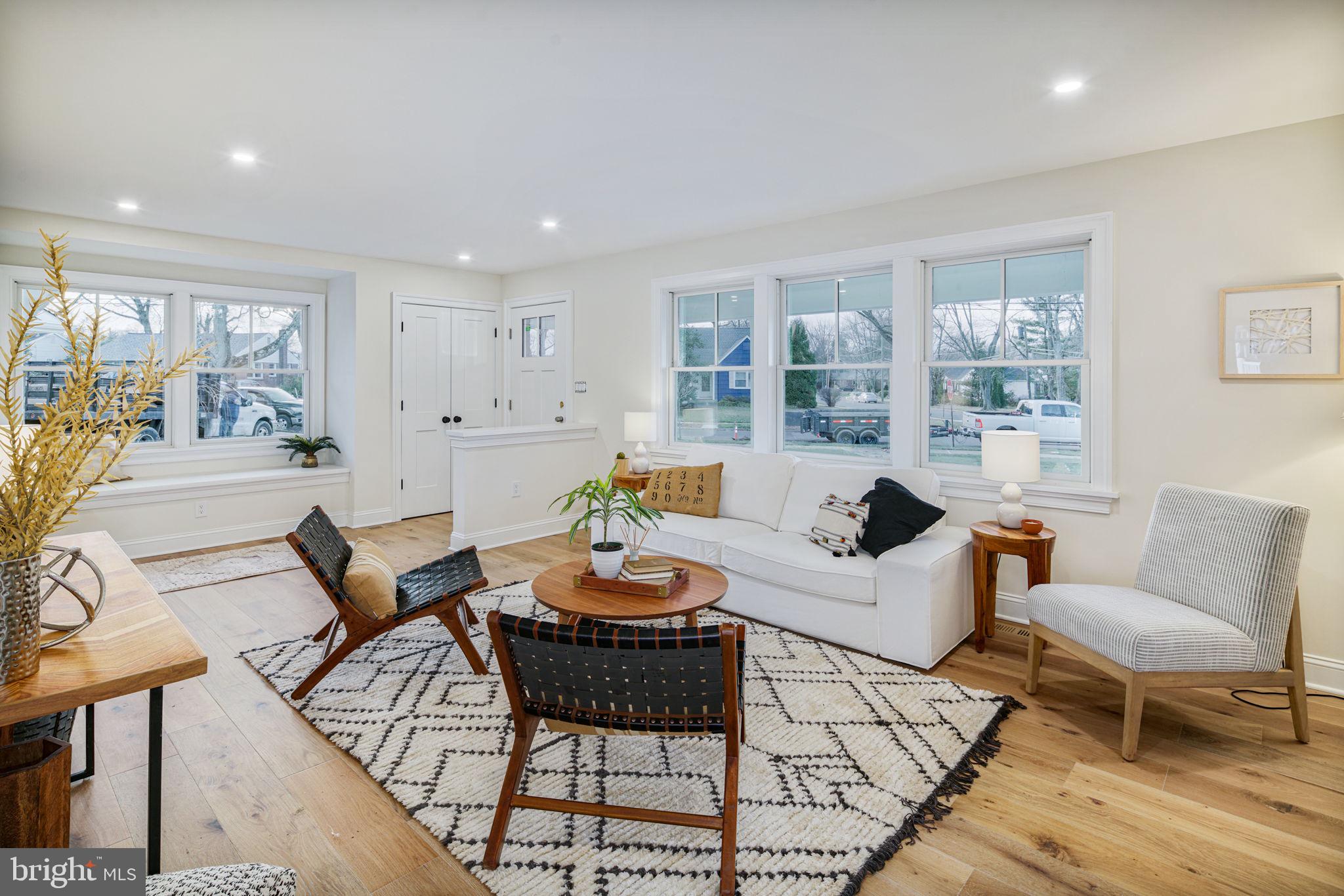 745 Cedar Avenue Haddonfield, NJ 08033 - Photo 7 of 55 a living room with furniture and a large window