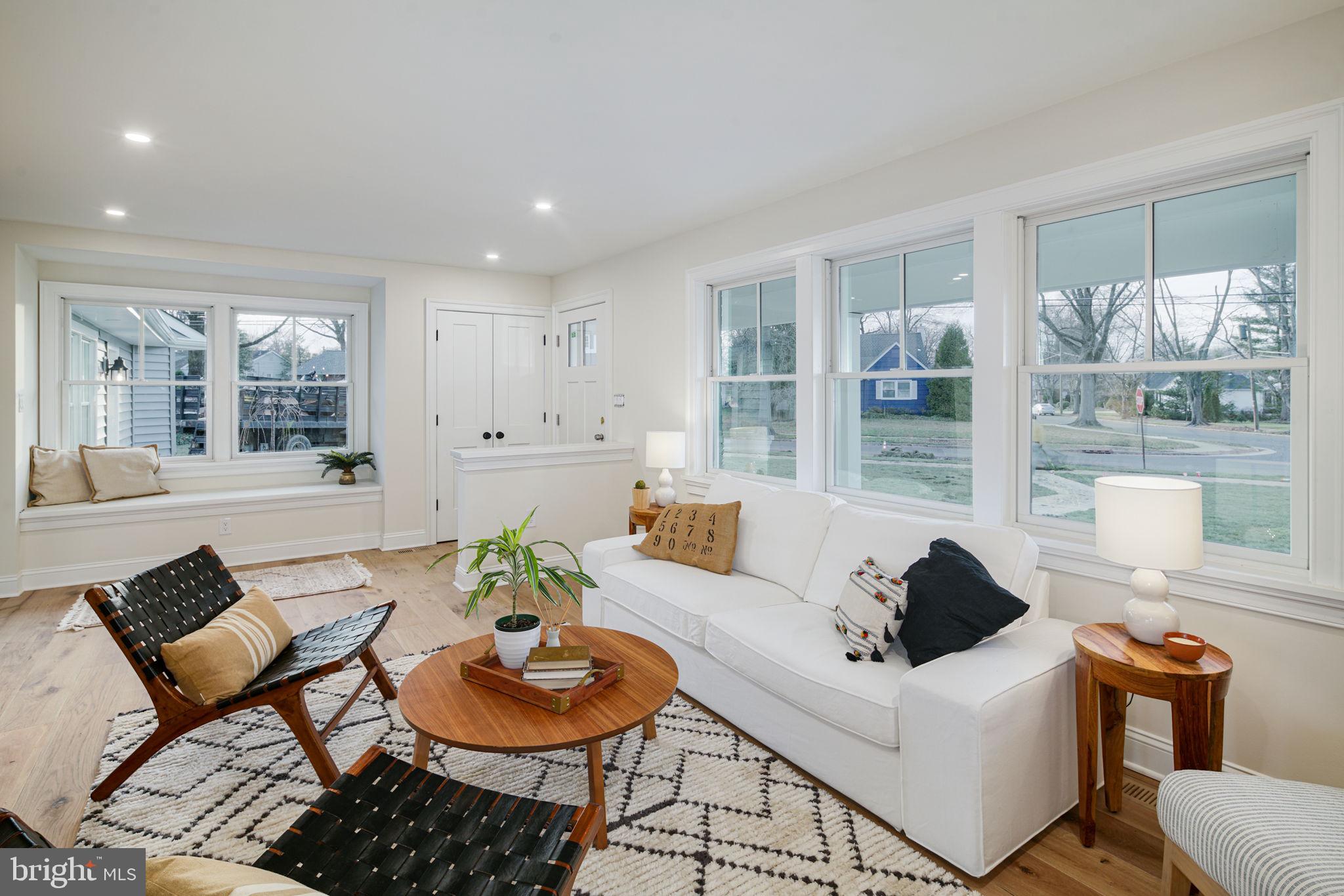 745 Cedar Avenue Haddonfield, NJ 08033 - Photo 10 of 55 a living room with furniture and a wooden floor