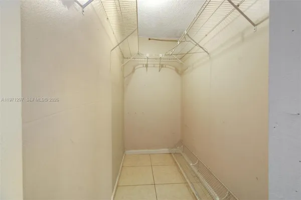 a view of a room with racks on the wall