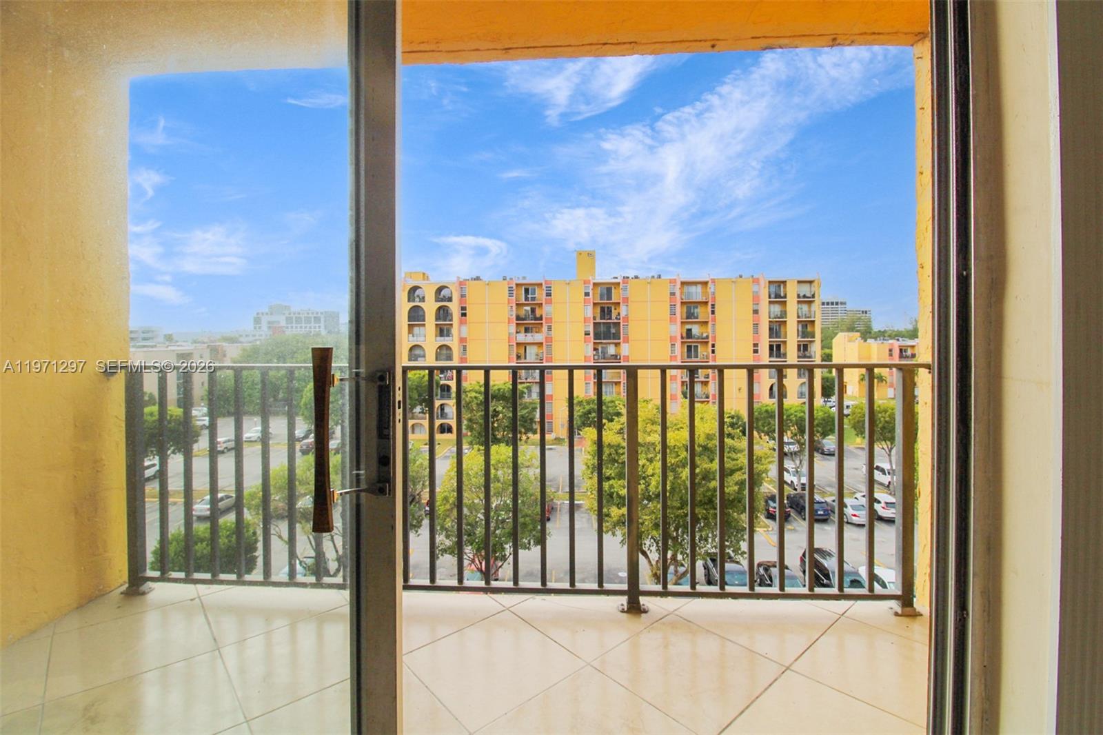 4717 Northwest 7th Street, Unit 60410 Miami, FL 33126 - Photo 15 of 19 a view of a balcony with city view