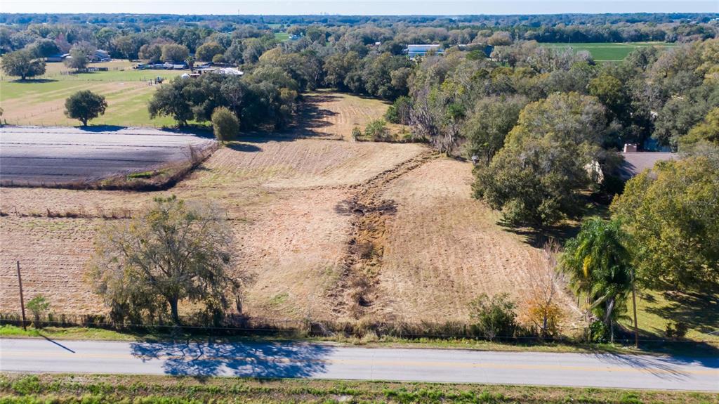 South Forbes Road Dover, FL 33527 - Photo 8 of 17 a view of a lake with a yard