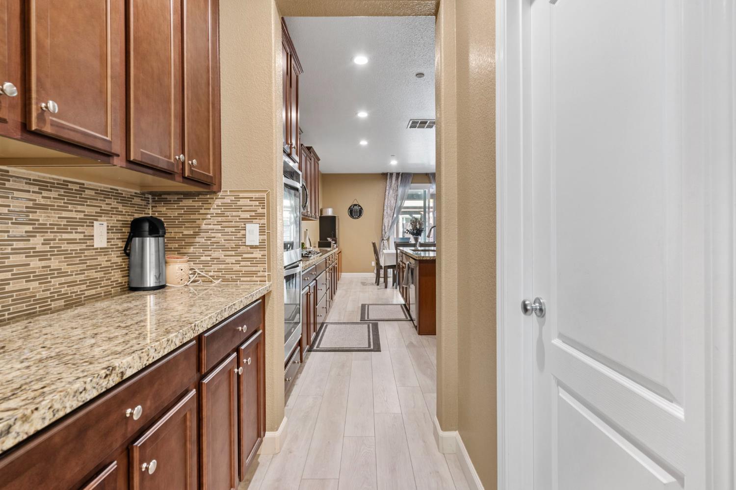 2317 Mathar Drive Manteca, CA 95337 - Photo 18 of 48 a view of a kitchen with a sink